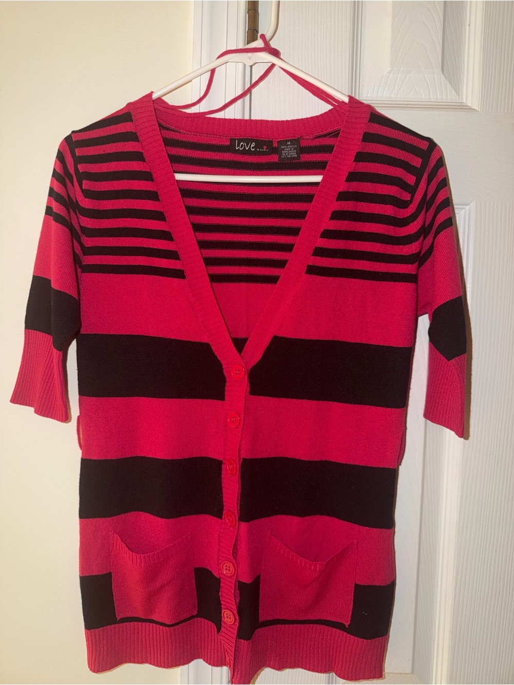pink and black striped cardigan
